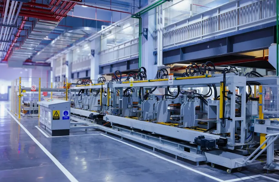 Automated production equipment on a clean factory floor