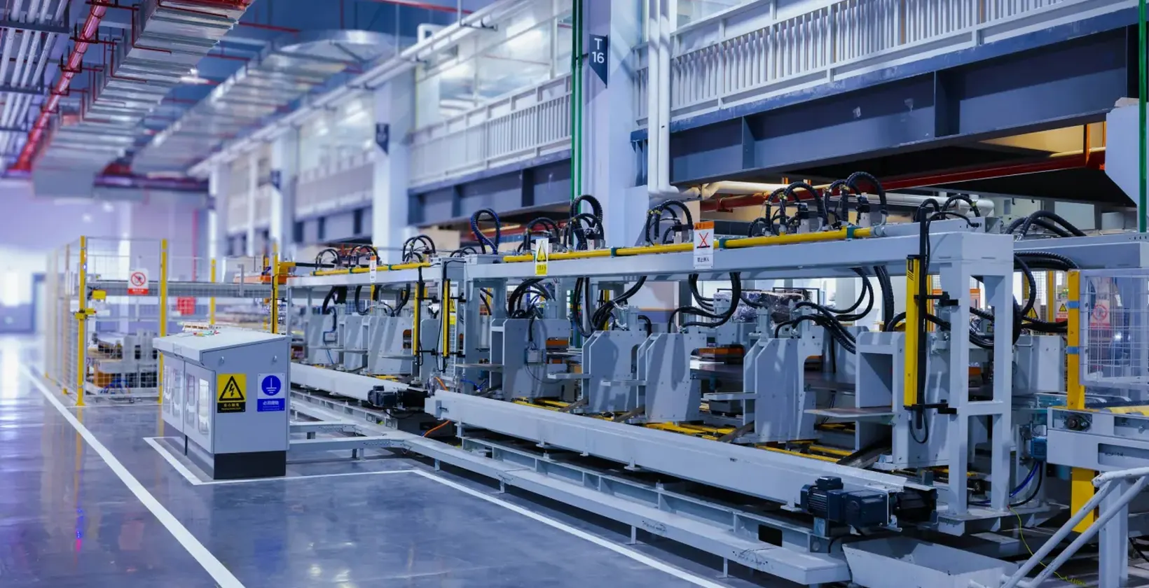 Automated production equipment on a clean factory floor